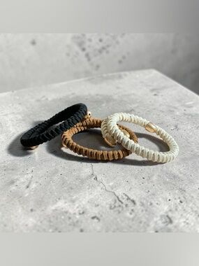 Plunder Black Braided Leather Spring Bracelet with Gold Cap Tips